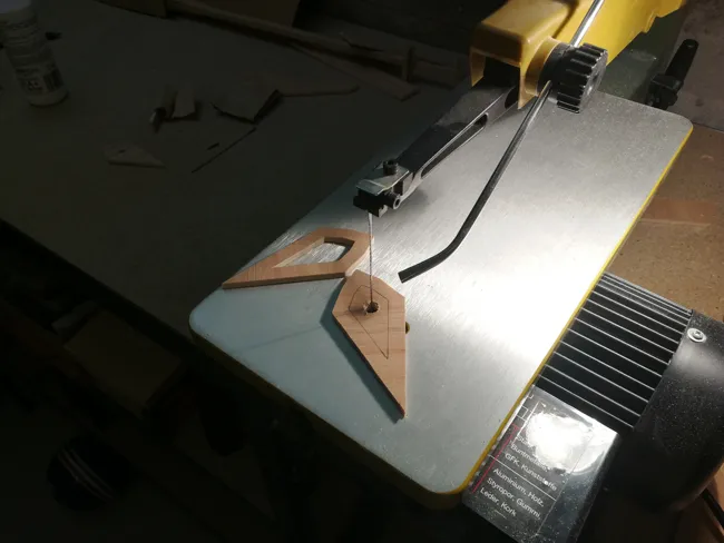The star being cut on the scroll saw
