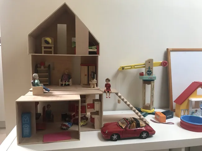 The doll's house furnished and filled with toys