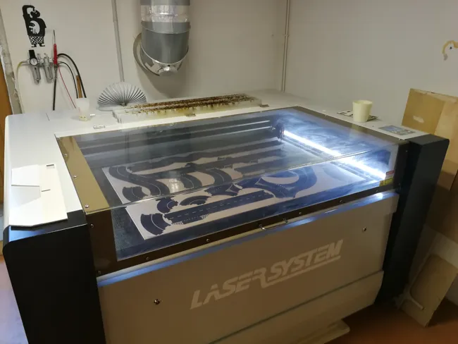 The roads being cut in the Laser System 1490 of the fablab