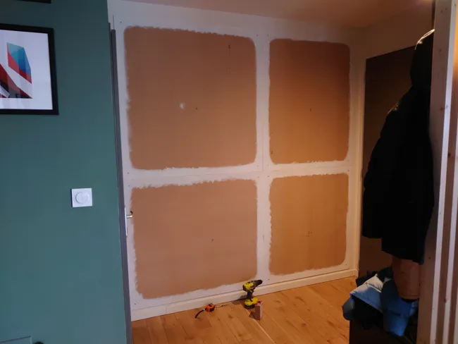Step 1: MDF panels attached to the wall with white-painted edges